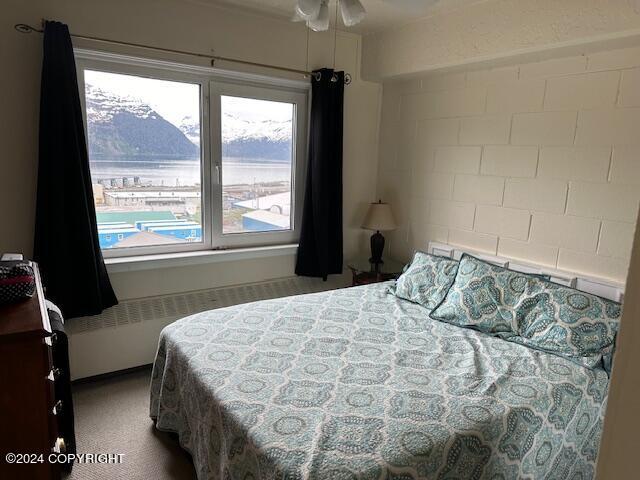 bedroom featuring ceiling fan