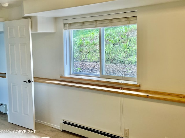 41385 Ptarmigan Heights Dr, Homer, AK 99603 - detailed view of baseboard heating, baseboards, and carpet floors