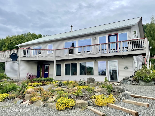 41385 Ptarmigan Heights Dr, Homer, AK 99603 - back of property featuring metal roof and a deck