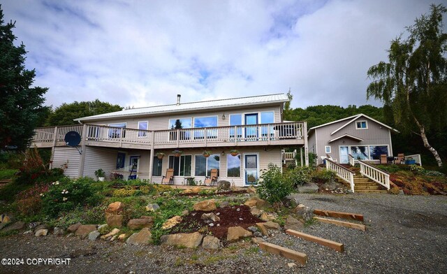 41385 Ptarmigan Heights Dr, Homer, AK 99603 - back of property featuring a deck