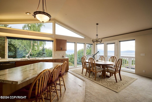 41385 Ptarmigan Heights Dr, Homer, AK 99603 - dining area featuring lofted ceiling, a chandelier, healthy amount of natural light, and light tile patterned floors