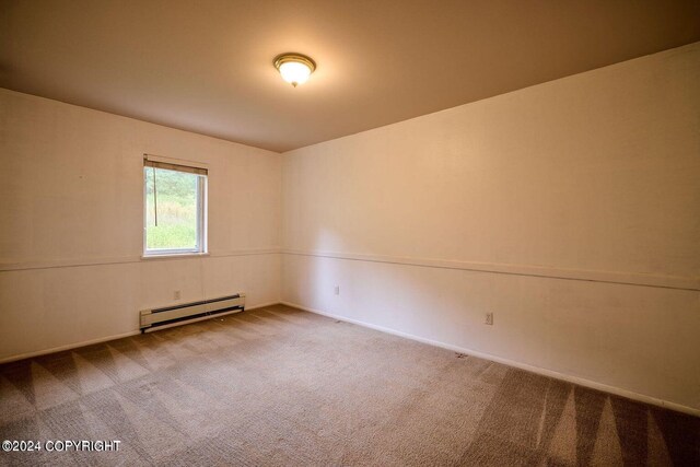 41385 Ptarmigan Heights Dr, Homer, AK 99603 - carpeted spare room with baseboard heating and baseboards