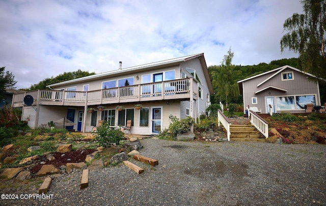 41385 Ptarmigan Heights Dr, Homer, AK 99603 - back of house featuring a deck