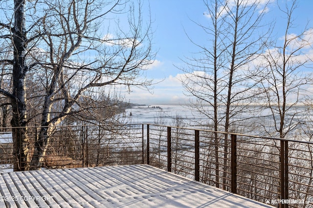 view of snow covered deck