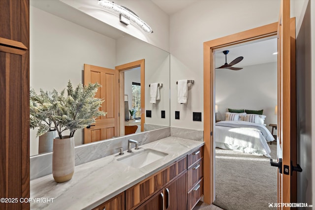 bathroom featuring vanity and ceiling fan