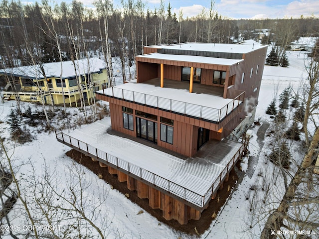 view of snow covered property