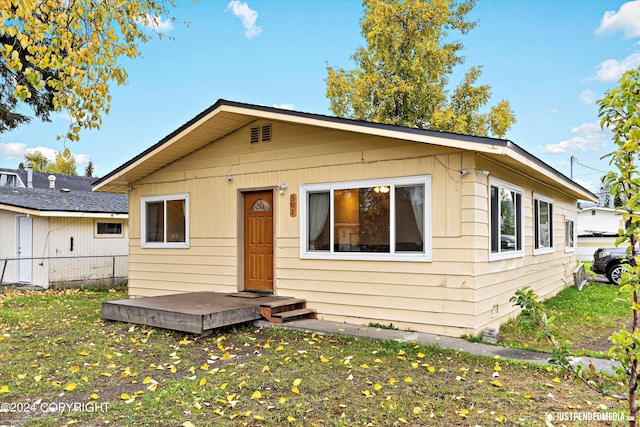 view of front of home with a front yard