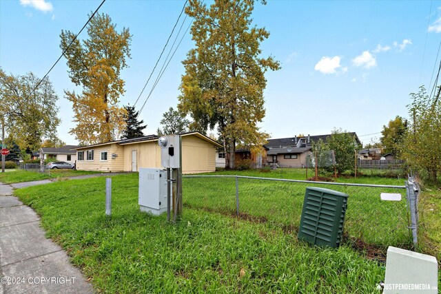 exterior space featuring a front lawn