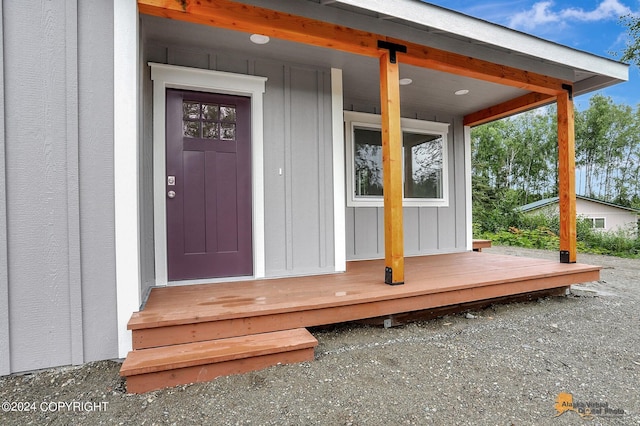 doorway to property with covered porch