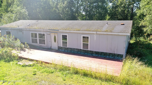 view of side of property with a patio area