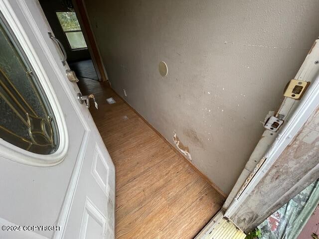 interior space with hardwood / wood-style flooring