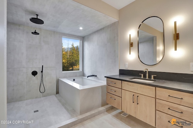 bathroom with vanity, separate shower and tub, and tile patterned floors