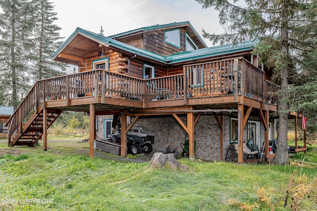 37325 Funny Moose Ln, Soldotna, AK 99669 - back of property with a wooden deck and stairway