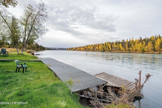 37325 Funny Moose Ln, Soldotna, AK 99669 - dock area featuring a water view, a lawn, and a forest view