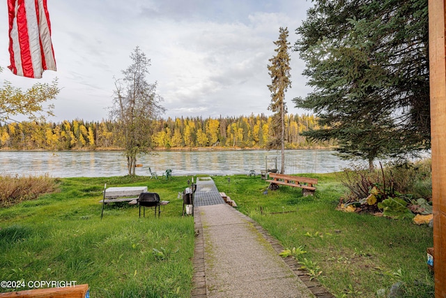 37325 Funny Moose Ln, Soldotna, AK 99669 - view of yard featuring a water view, a view of trees, and a dock