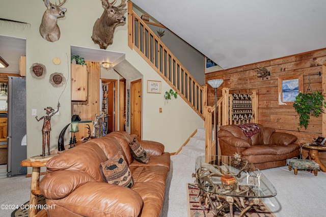 37325 Funny Moose Ln, Soldotna, AK 99669 - carpeted living area with stairs and wood walls