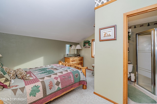 bedroom featuring carpet flooring and lofted ceiling