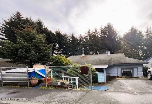 view of front of home featuring a garage