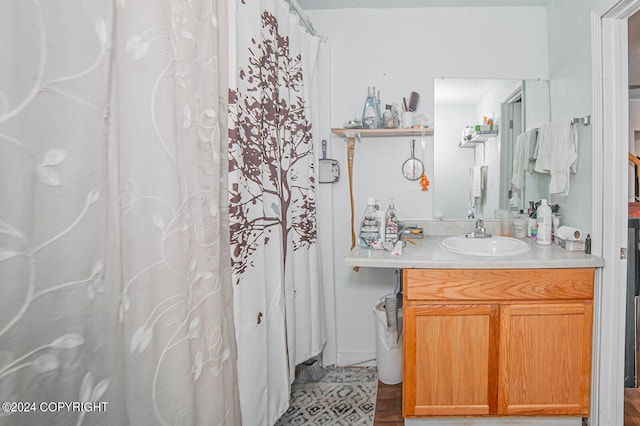 bathroom with vanity and a shower with curtain