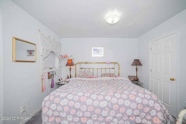 bedroom featuring carpet flooring