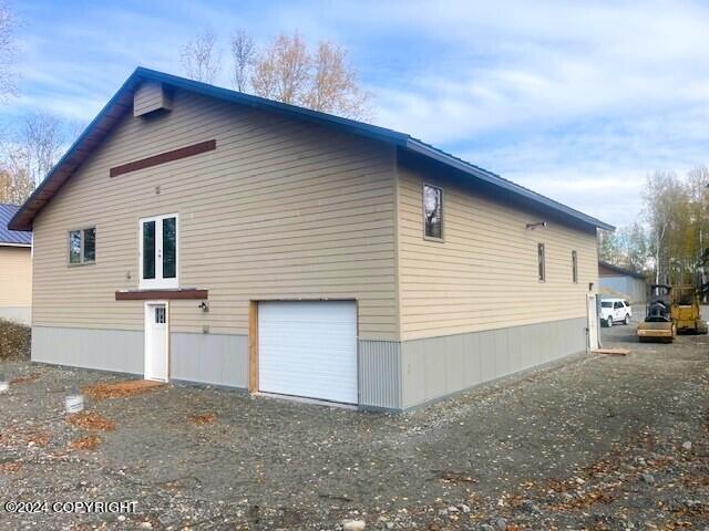 view of home's exterior featuring a garage