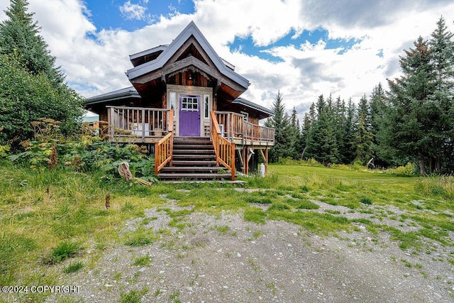 38126 Bobby Rufus Rd, Homer, AK 99603 - view of front of house with a deck and stairs