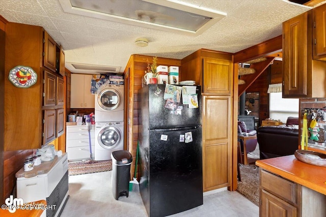 34464 Fishermans Rd, Soldotna, AK 99669 - washroom with stacked washer / dryer