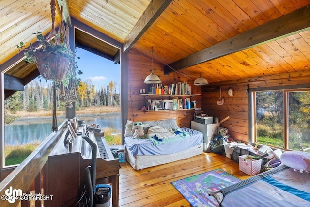34464 Fishermans Rd, Soldotna, AK 99669 - bedroom featuring wooden ceiling, a water view, wooden walls, and hardwood / wood-style floors