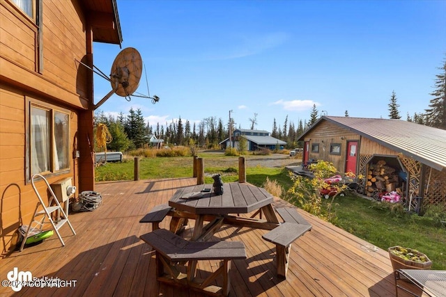 34464 Fishermans Rd, Soldotna, AK 99669 - deck featuring outdoor dining area and a yard