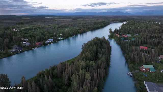 34464 Fishermans Rd, Soldotna, AK 99669 - aerial view of property and surrounding area with a forest and a water and mountain view