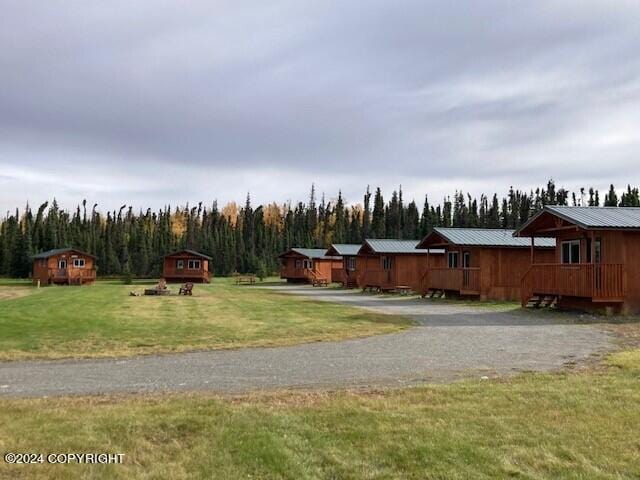 view of yard featuring a wooden deck