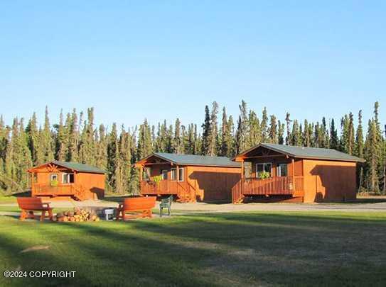 42781 Brenda Way, Soldotna, AK 99669 - back of house with a yard