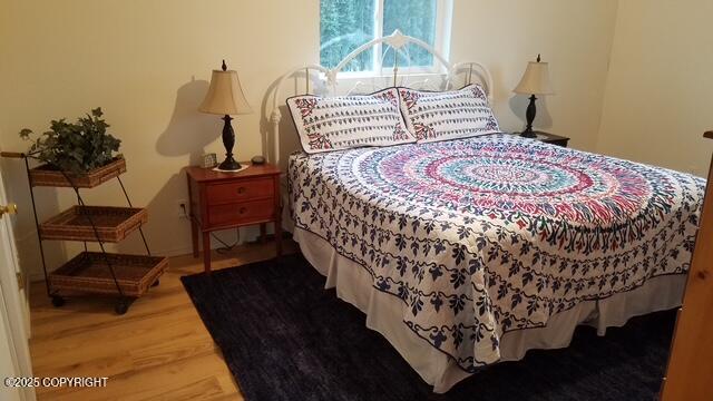 42781 Brenda Way, Soldotna, AK 99669 - bedroom with wood finished floors
