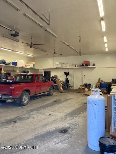 42781 Brenda Way, Soldotna, AK 99669 - garage featuring a garage door opener