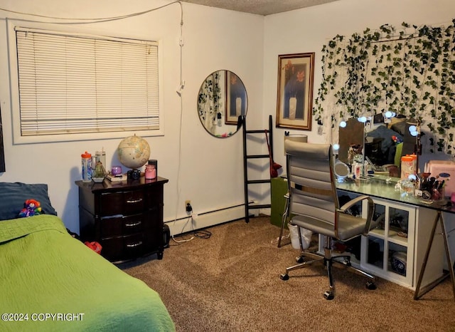 bedroom with carpet flooring and a baseboard heating unit