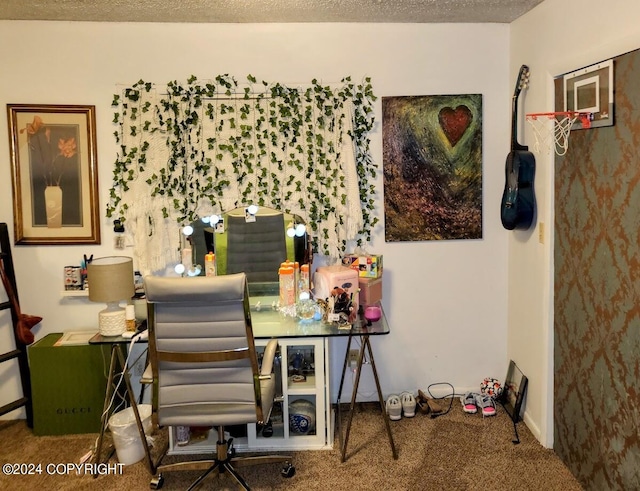 office featuring carpet and a textured ceiling