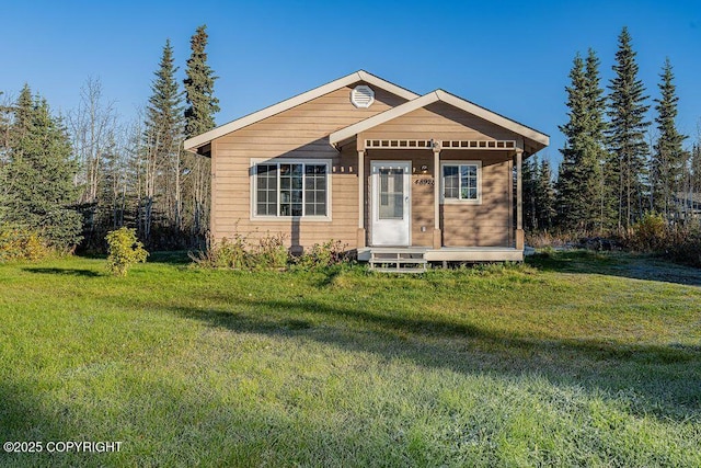 view of front of home featuring a front lawn