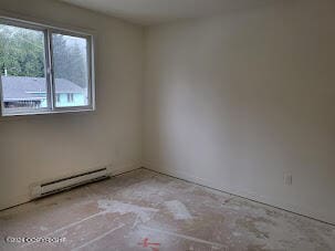 spare room with a baseboard radiator