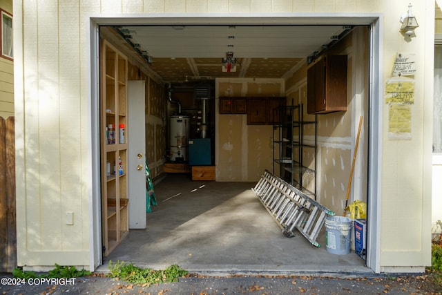 garage featuring gas water heater