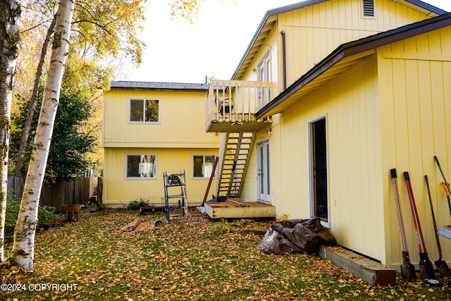 rear view of house with a balcony