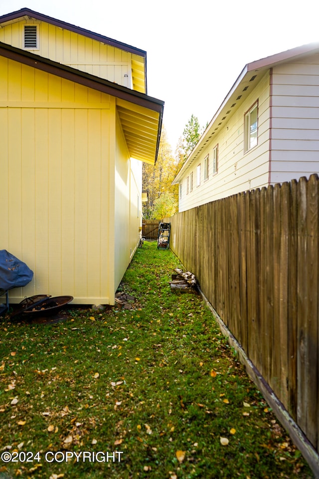 view of home's exterior featuring a lawn