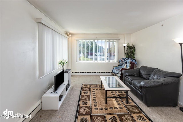 carpeted living room with a baseboard radiator