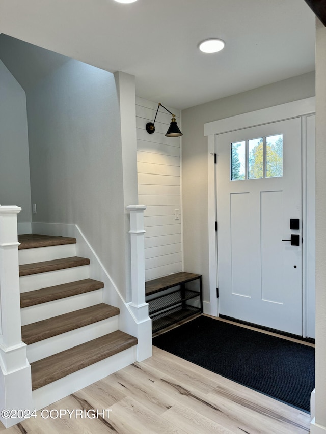 entrance foyer featuring wood-type flooring