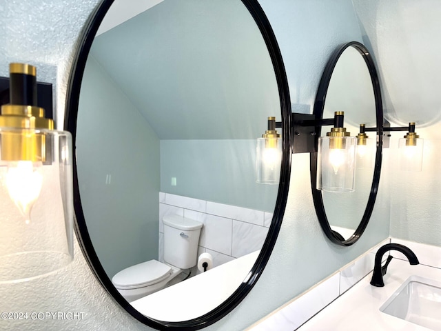 interior details with vanity and toilet