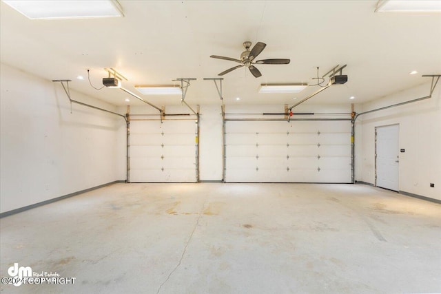 garage featuring ceiling fan and a garage door opener