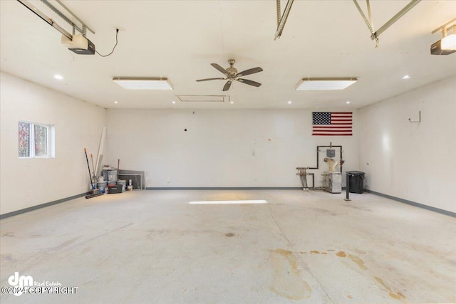 garage featuring a garage door opener and ceiling fan