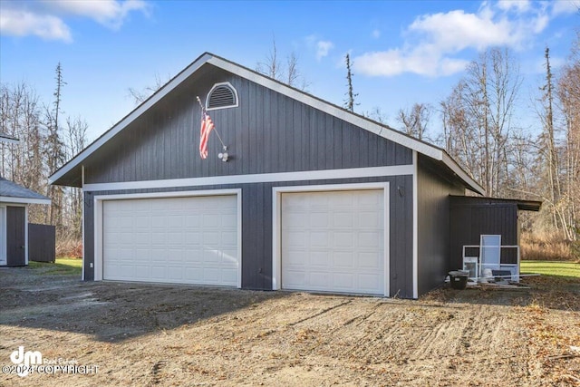 garage with wood walls