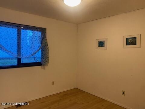 1915 Dora Way, Seward, AK 99664 - empty room featuring wood finished floors and baseboards