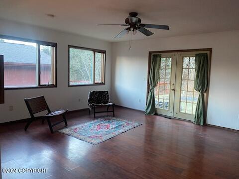 1915 Dora Way, Seward, AK 99664 - living area featuring wood finished floors, ceiling fan, and french doors