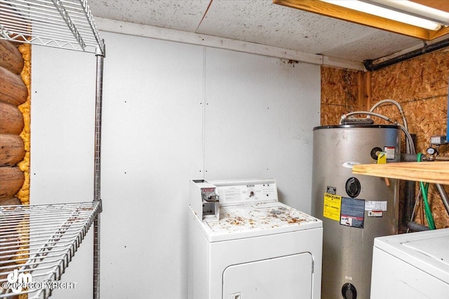 washroom featuring water heater and rustic walls